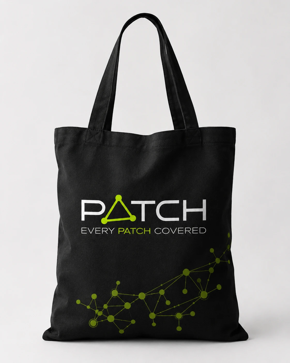 Black canvas tote with the PATCH logo and a lime network across the bottom