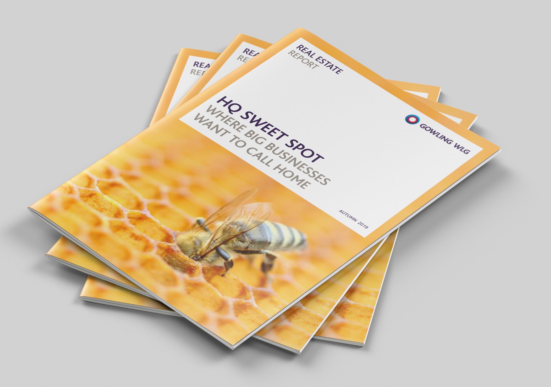 A stack of HQ Sweet Spot reports with a bee on honeycomb